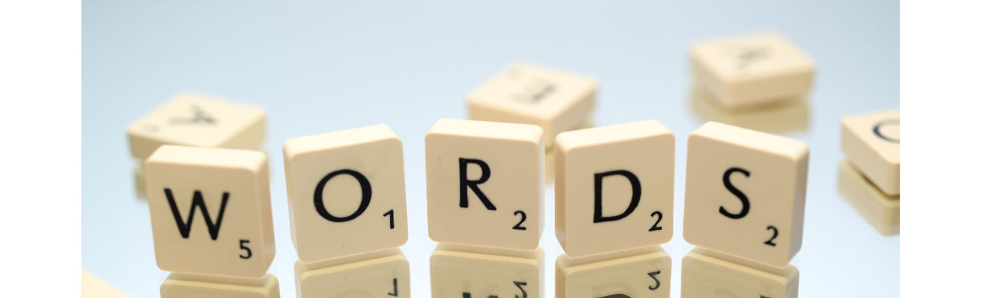Scrabble tiles spelling words