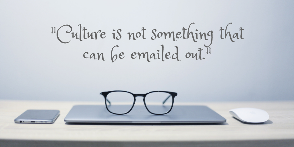 Photo of a laptop with the words Culture is not something that can be emailed out
