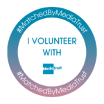 A blue and grey circle with the words #MatchedByMediaTrust and I volunteer with Media Trust